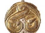 Fig. 2. A pendant made in bronze gilded with silver and gold, AD 5th c., Lund University Historical Museum (photo B. Almgren).