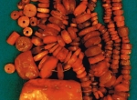 Fig. 2. Świlcza, Świlcza commune, Rzeszów district, site 3. Lumps of amber and amber beads; Photo. S. Czopek (by permission of the district museum in Rzeszów).